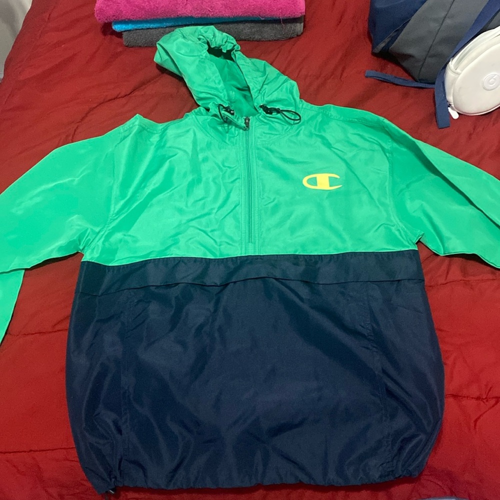 green and blue champion rain jacket